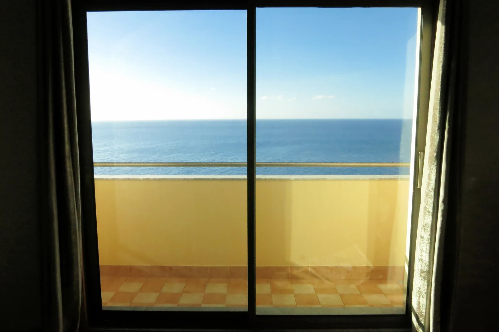 The terrace of the beachfront penthouse looking over the ocean