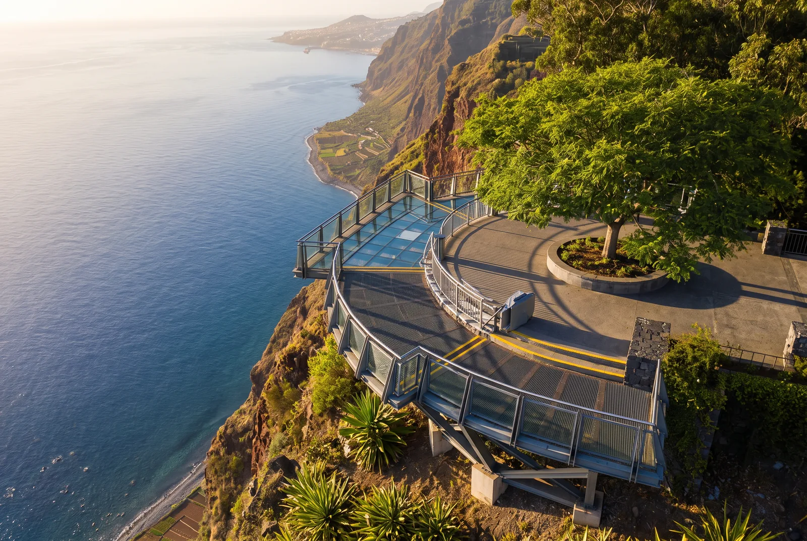The glass floor at Cabo Girão, 580 metres above the fajãs. In summer the clouds settle on the cliff by mid-morning, so the view is an early proposition.