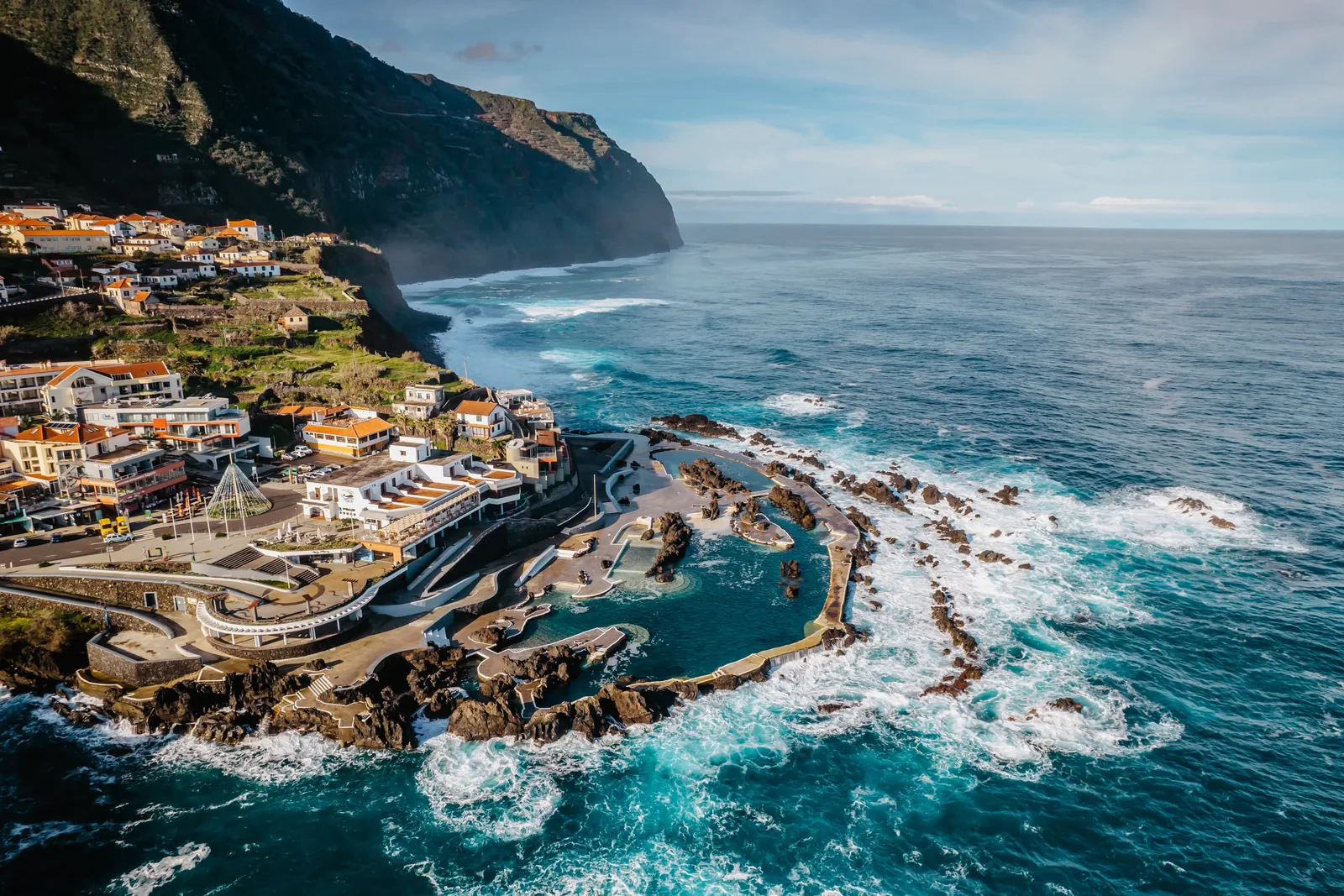 The volcanic lava pools of Porto Moniz on Madeira's north-west corner, with Atlantic swell breaking outside