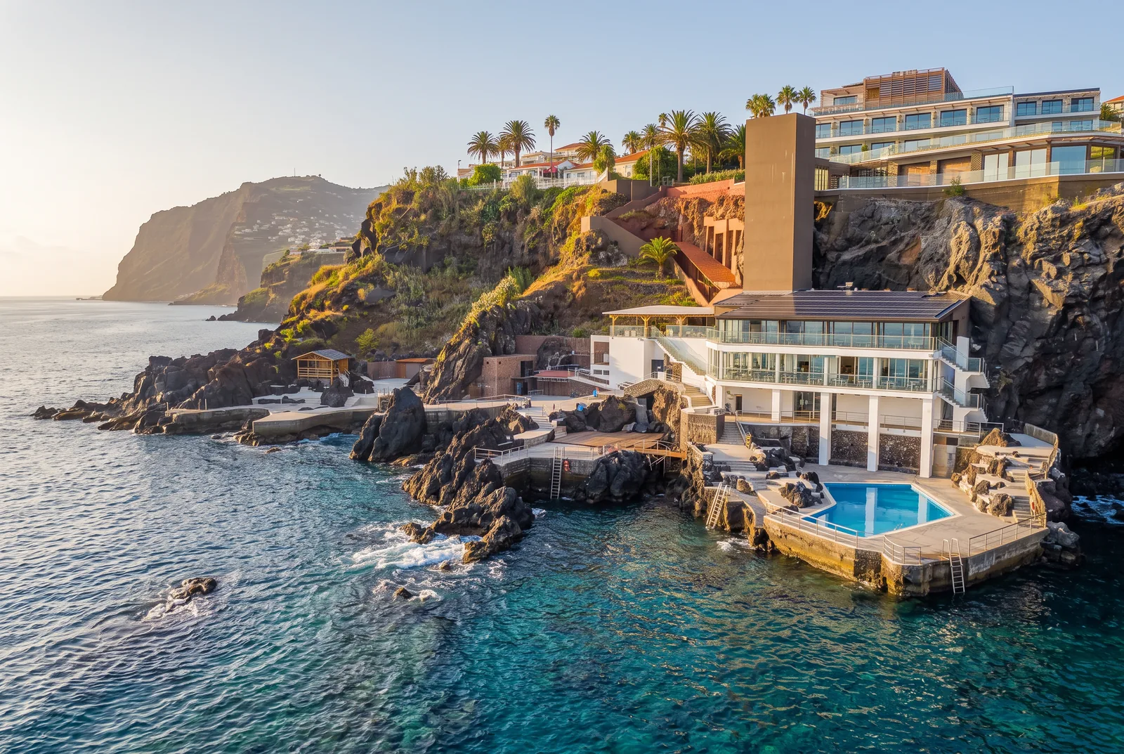 The Lido Galomar bathing complex at Caniço de Baixo, with concrete terraces and a seawater pool on black lava rock