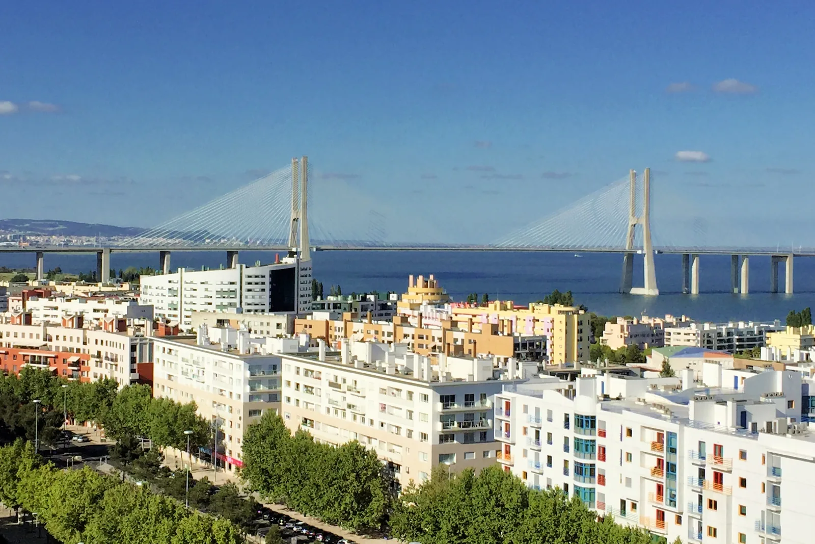 The Vasco da Gama bridge seen over the residential blocks of Parque das Nações